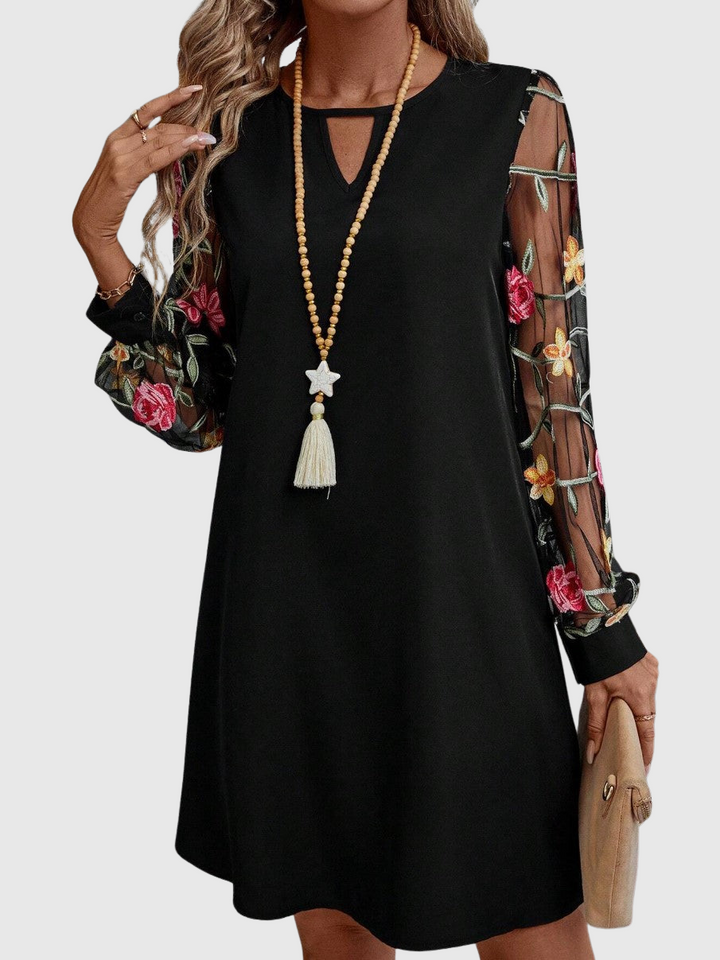 Jolanta | Elegantní šaty s výstřihem do V a výraznými rukávy