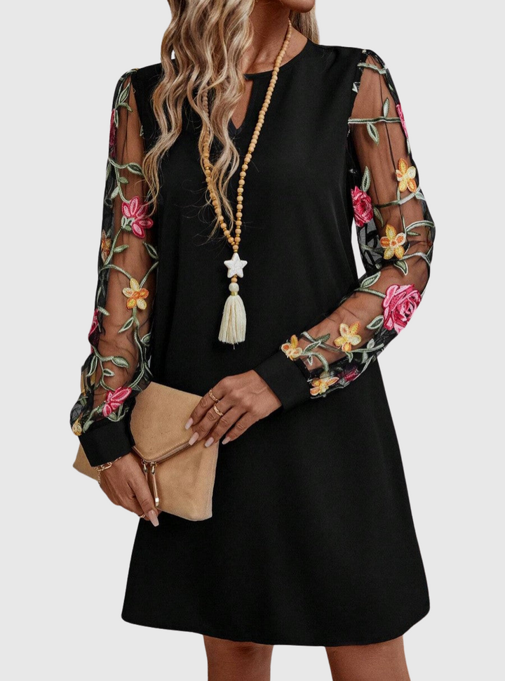 Jolanta | Elegantní šaty s výstřihem do V a výraznými rukávy