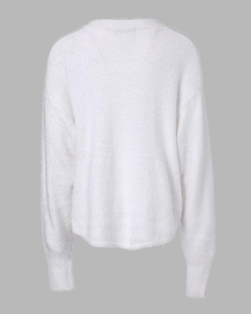 Volný svetr s výstřihem do V , dlouhým rukávem a korálky, zdobený ozdobou